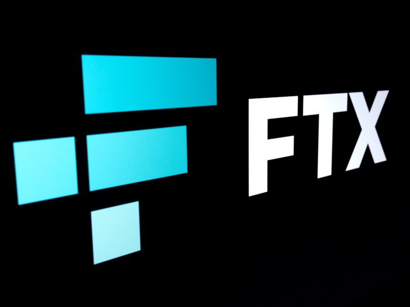 FTX Cryptocurrency Exchange company logo seen on a dark display.