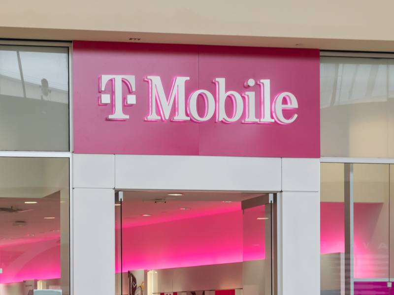 Am image of a T-Mobile building with the standard pink and white branding.