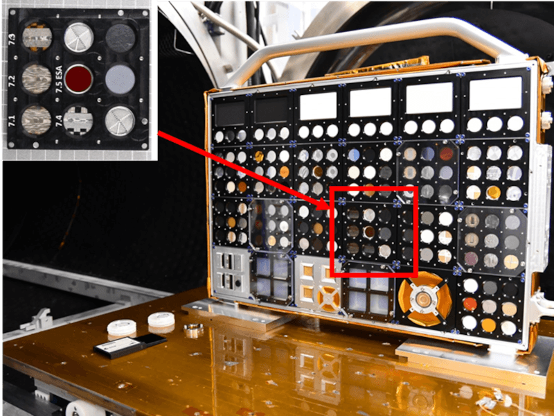 A box with different materials laid out for testing in space.