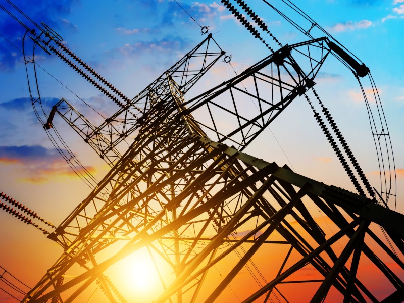 High-voltage tower with the sky in the background.