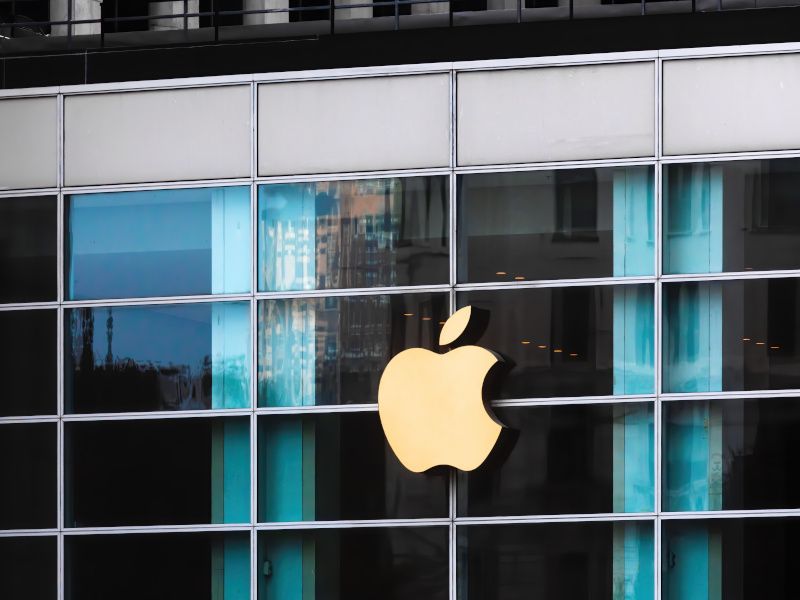 Apple store logo on a glass building.