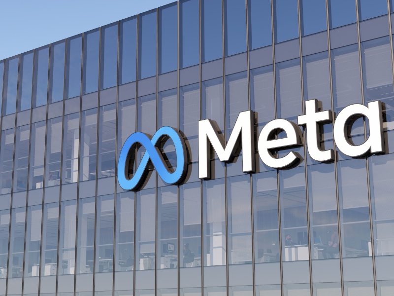 A large glass-covered building displaying the Meta logo. Meta recently made headlines by bringing UFC CEO Dana White onboard.