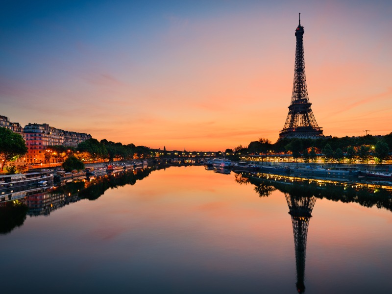 A photo showing a scene from Paris, France, which also has the Eiffel Tower in view.