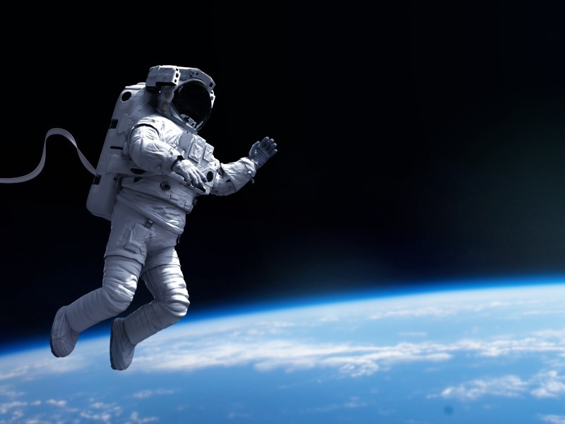 An astronaut floating in space. This symbolises the news that Aquila Bioscience and the ESA are collaborating for a project.